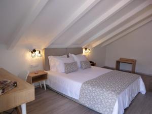 Ένα ή περισσότερα κρεβάτια σε δωμάτιο στο Anemoessa Elegant Apartments