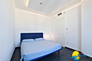 Postelja oz. postelje v sobi nastanitve SH-Salento Luxury Apartment Giuseppe