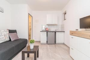 Kuchyň nebo kuchyňský kout v ubytování Apartments Rede