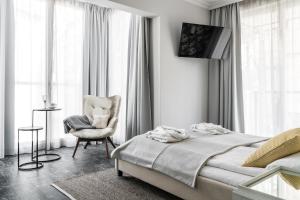 Posteľ alebo postele v izbe v ubytovaní Monte Carlo Luxury Suites with Parking by Lion Apartments Sopot