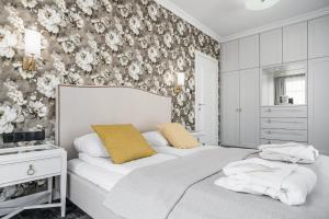 En eller flere senger på et rom på Lion Apartments - Monte Carlo Deluxe with parking