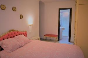 Posteľ alebo postele v izbe v ubytovaní Casa Plaza Sierra Grazalema