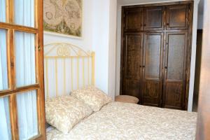 Posteľ alebo postele v izbe v ubytovaní Casa Plaza Sierra Grazalema