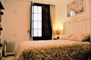 Posteľ alebo postele v izbe v ubytovaní Casa Plaza Sierra Grazalema