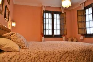 Posteľ alebo postele v izbe v ubytovaní Casa Plaza Sierra Grazalema