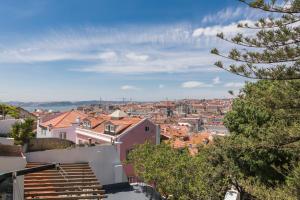 a view of a city from a hill at The Castle Life in 3BDR apartament in Lisbon