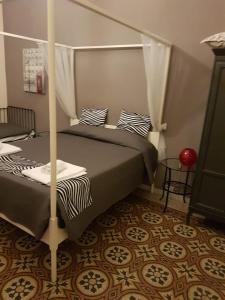 Łóżko lub łóżka w pokoju w obiekcie Happy Stay Guesthouse