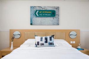 Voodi või voodid majutusasutuse Lagos Mare Hotel toas