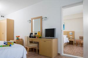 Voodi või voodid majutusasutuse Lagos Mare Hotel toas