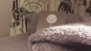 A bed or beds in a room at L'albero Di Famiglia