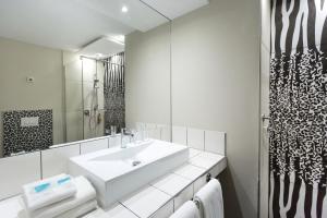 Ванная комната в Hotel Kalura