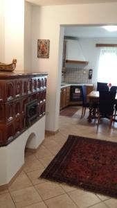 a living room with a kitchen and a dining room at moonflower in Pliskovica