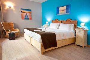 A bed or beds in a room at Relais Lo Stagnone