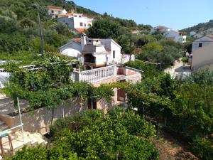 an aerial view of a house on a hill at 21 Kosinac GREEN PARADISE in Vinišće