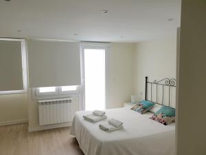 Cama o camas de una habitación en Apartamentos-Bermeo