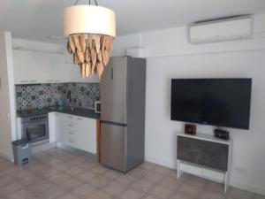 Kuchyň nebo kuchyňský kout v ubytování APARTAMENTO ACOGEDOR CON VISTAS AL MAR + 8 fotografií