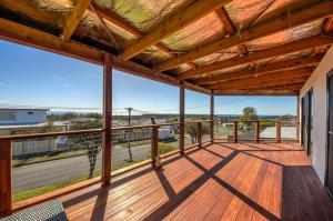 a view from the deck of a house with a roof at Bayviews in Portarlington