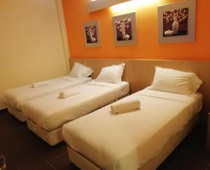 Postel nebo postele na pokoji v ubytování Fomecs Boutique Hotel, Jonker Street