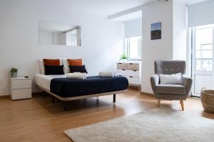 Ένα ή περισσότερα κρεβάτια σε δωμάτιο στο Belém - Fully equiped Studio