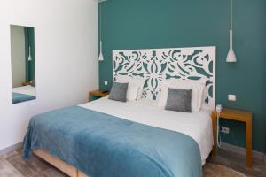Postel nebo postele na pokoji v ubytování Mareta View - Boutique Bed & Breakfast