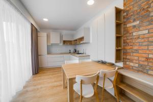 Kuchyňa alebo kuchynka v ubytovaní Apartment Dolfi, Senec