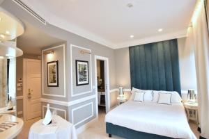 Voodi või voodid majutusasutuse Hotel Vis à Vis toas