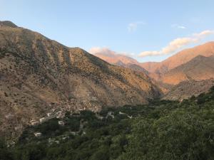 a village in a valley in the mountains at Amlougui House in Marrakesh