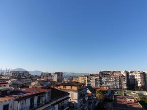 a view of a city with buildings at fitta camere portanolana in Naples