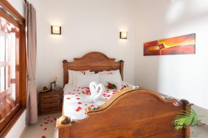 Postel nebo postele na pokoji v ubytování Finca Hotel Guali Santafe