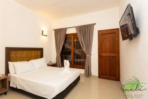 TV a/nebo společenská místnost v ubytování Finca Hotel Guali Santafe