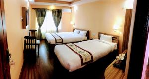 Voodi või voodid majutusasutuse Kathmandu Garden Home toas