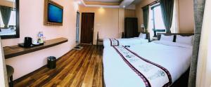 Voodi või voodid majutusasutuse Kathmandu Garden Home toas