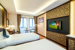 Afbeelding uit fotogalerij van Conifer Grand Hotel in Hanoi