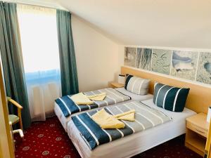 Fotografie z fotogalerie ubytování Hotel-Pension "Petridamm" v Rostocku + 16 fotografií