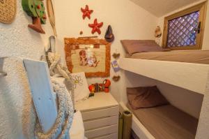 Postel nebo postele na pokoji v ubytování Villa B2 codice IUN Q1844