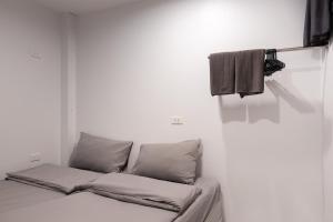 Posezení v ubytování Minimal House Patong
