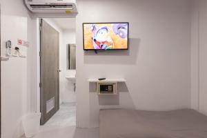TV a/nebo společenská místnost v ubytování Minimal House Patong