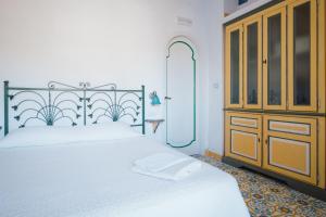 Postel nebo postele na pokoji v ubytování B&B Orto Paradiso