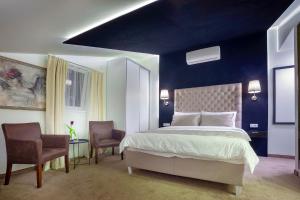 Giường trong phòng chung tại 4Rooms 4U