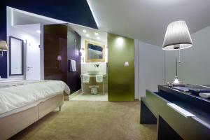 Voodi või voodid majutusasutuse 4Rooms 4U toas