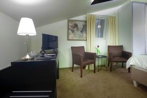 Televiisor ja/või meelelahutuskeskus majutusasutuses 4Rooms 4U