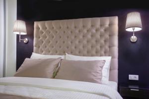 Voodi või voodid majutusasutuse 4Rooms 4U toas