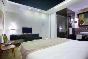 Voodi või voodid majutusasutuse 4Rooms 4U toas