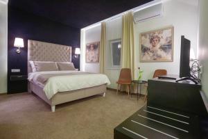 Voodi või voodid majutusasutuse 4Rooms 4U toas