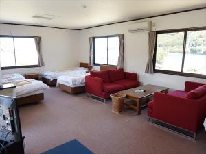 Postel nebo postele na pokoji v ubytování Sea Tiger Island Inn Shodoshima