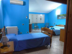 מיטה או מיטות בחדר ב-Casa da Pina