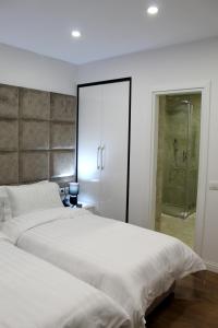 Voodi või voodid majutusasutuse Ramel Hotel toas