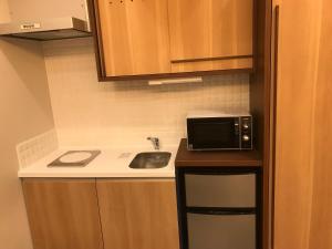 Kuchyň nebo kuchyňský kout v ubytování Hotel Yururito Osaka