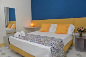 Ένα ή περισσότερα κρεβάτια σε δωμάτιο στο San Domenico Accommodation Maiori
