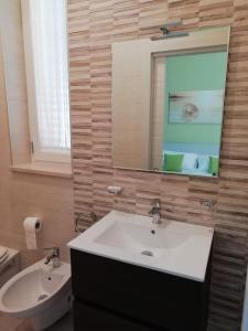 Kúpeľňa v ubytovaní Flamingo Rooms